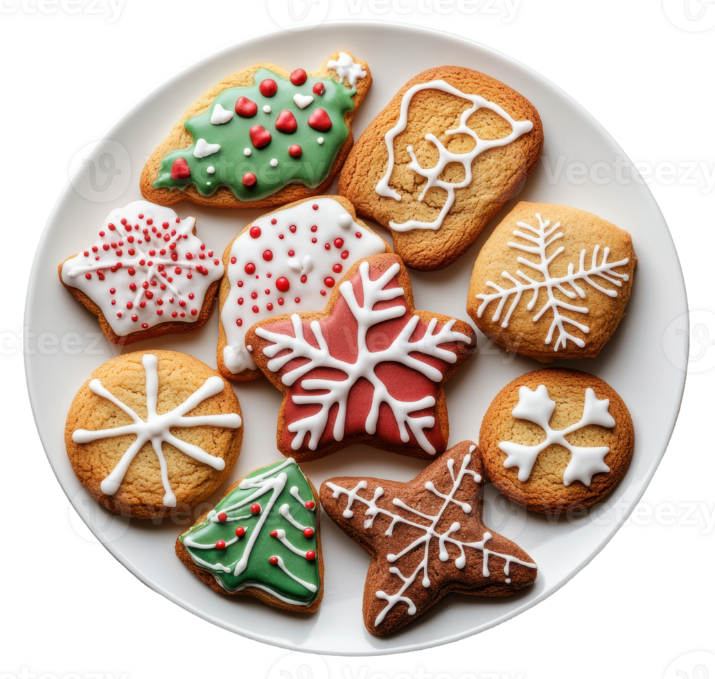 Decorative holiday cookies on a white plate, cut out - stock . png