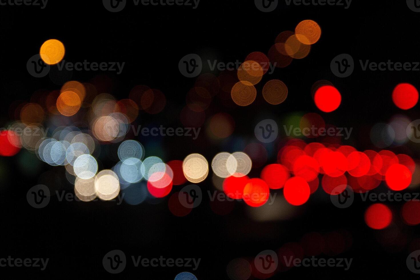 Multicolored lights bokeh background. bokeh texture of street colored lights photo