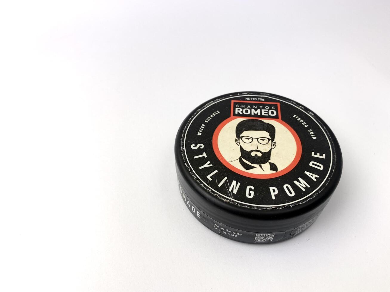a can of romeo styling pomade on a white surface. Indonesia, Sibolga, 10 August 2024. photo