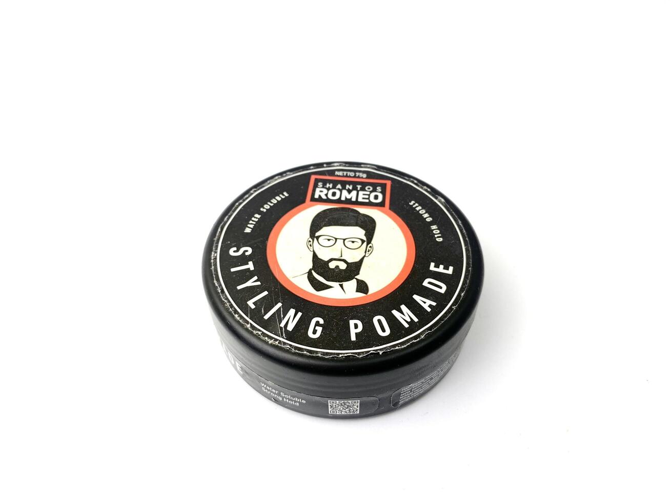 a can of romeo styling pomade on a white surface. Indonesia, Sibolga, 10 August 2024. photo