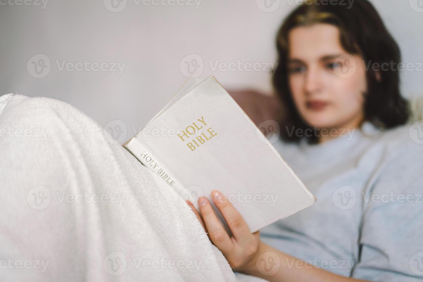 A Christian reads the Bible and drinks coffee. Religion concept. photo