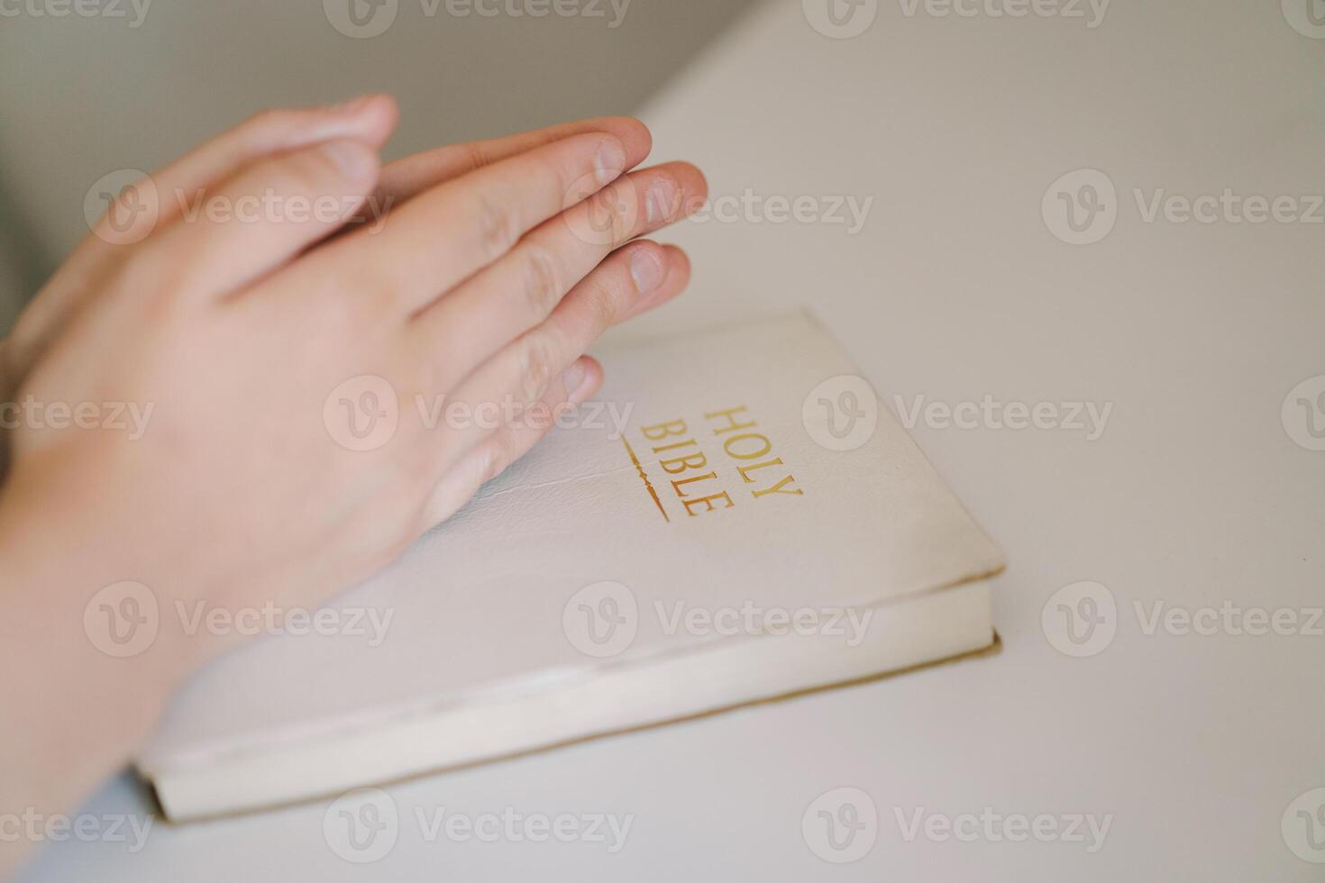 A Christian reads the Bible and drinks coffee. Religion concept. photo