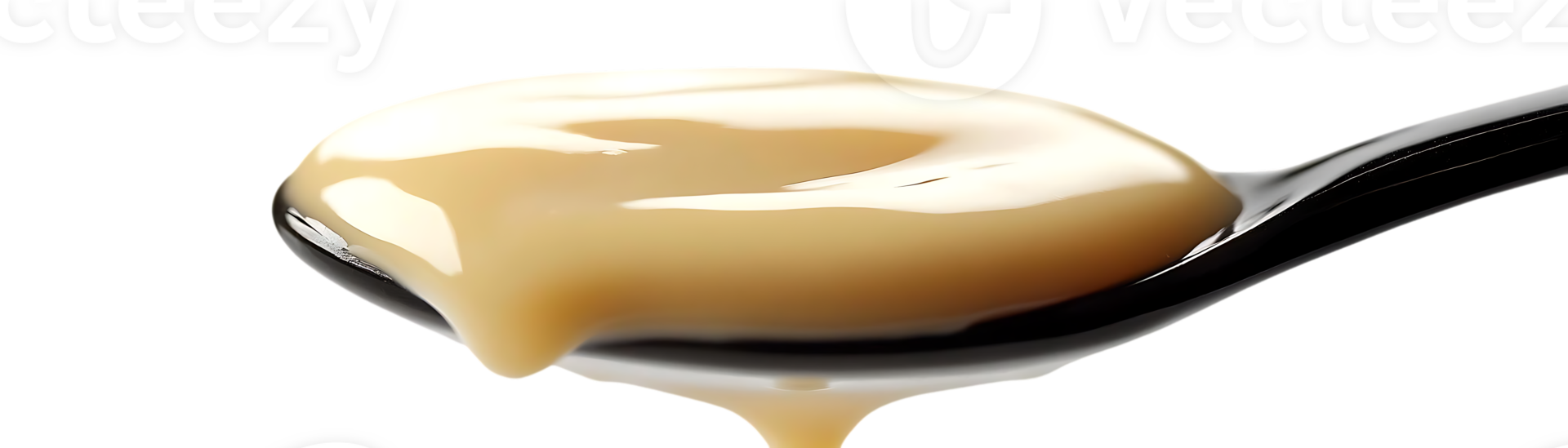 Sweet Condensed Milk Dripping from a Spoon with a Transparent Background png