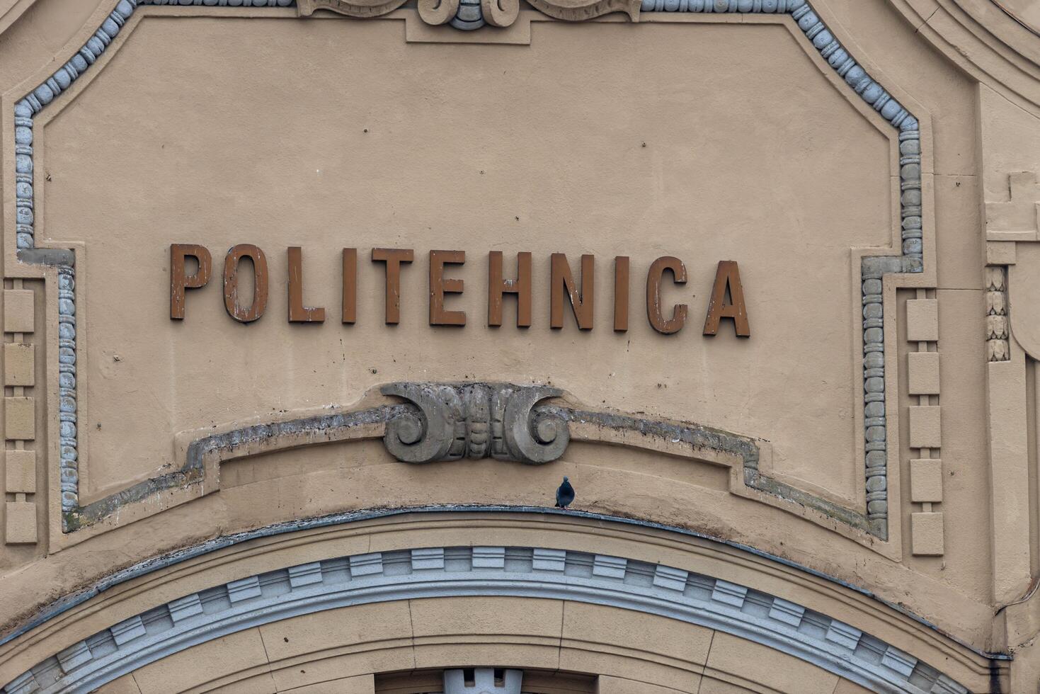 Timisoara, Romania - October 13, 2012 Close-up of the Politehnica University of Timisoara building with focus on the logo photo