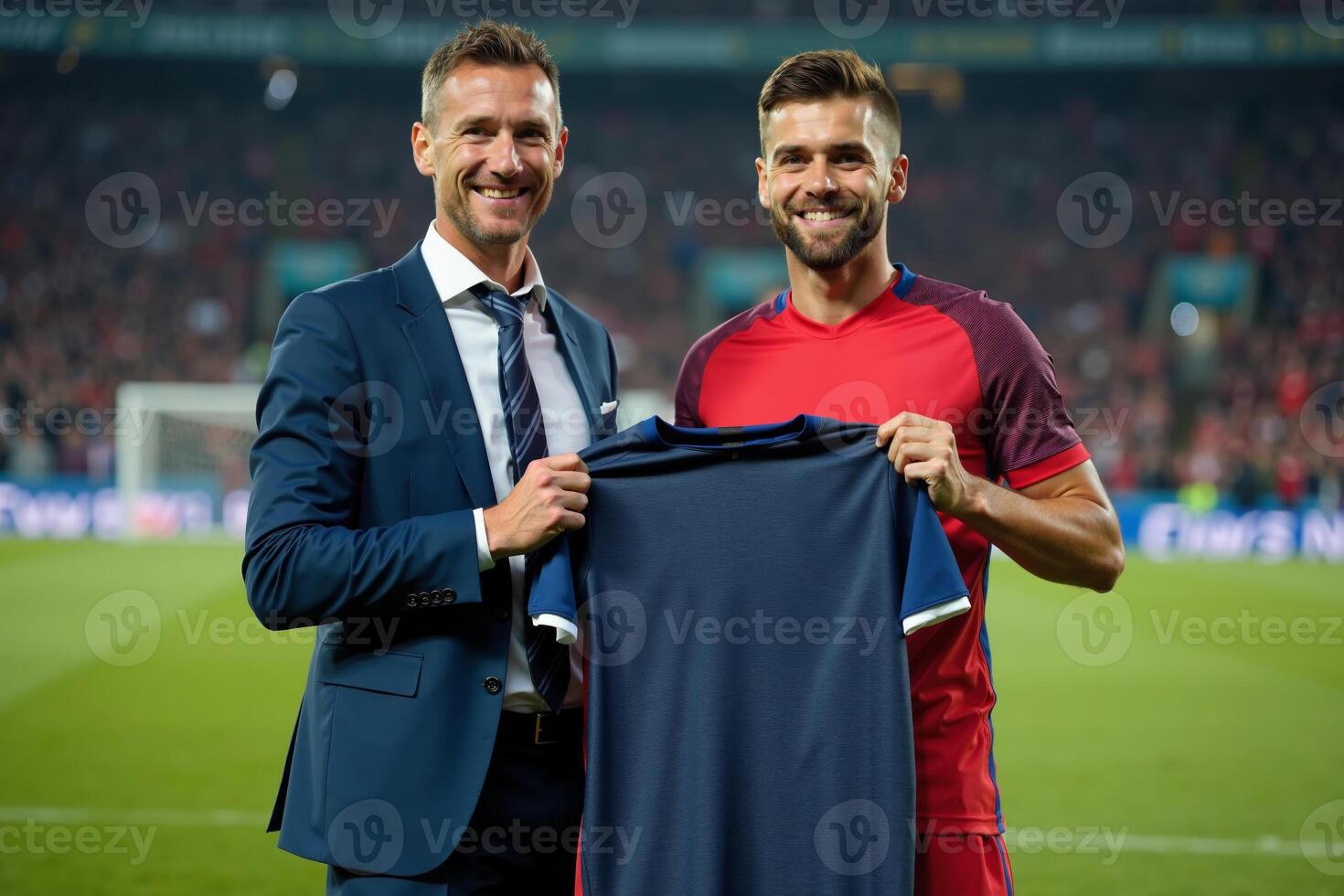 photo of coach and player holding shirt in the stadium field at signing contract event,