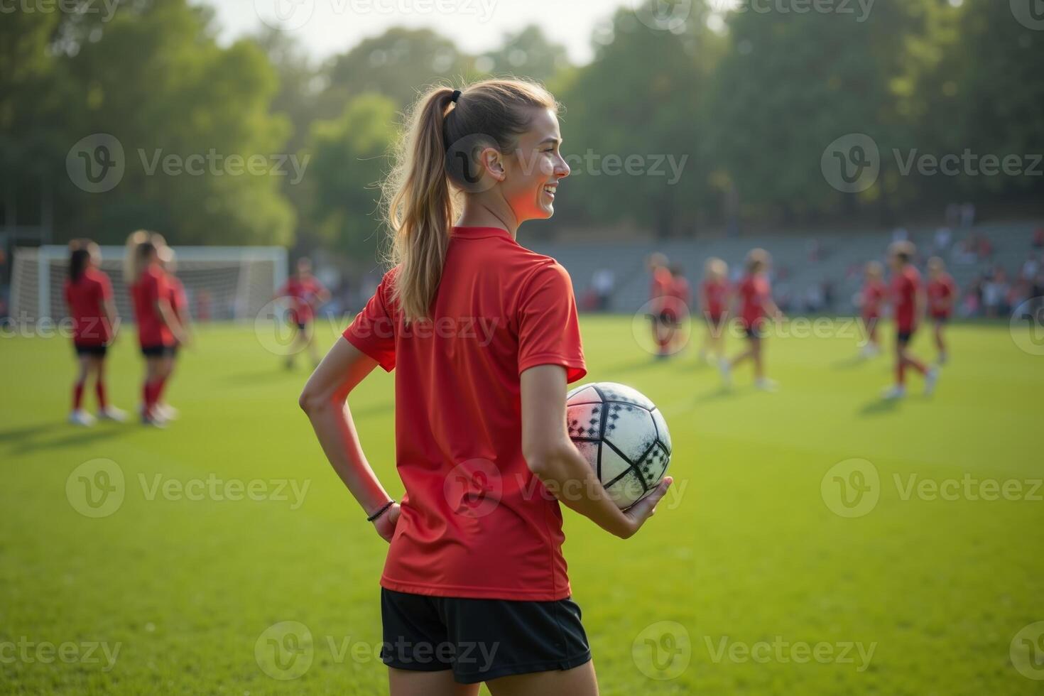 photo of teenage youth soccer player at soccer field,