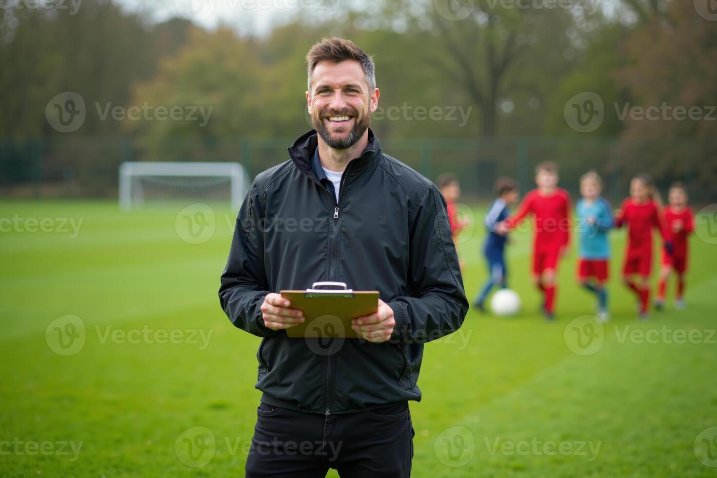 photo of coach instructor trainer teaching teenage player at soccer field,