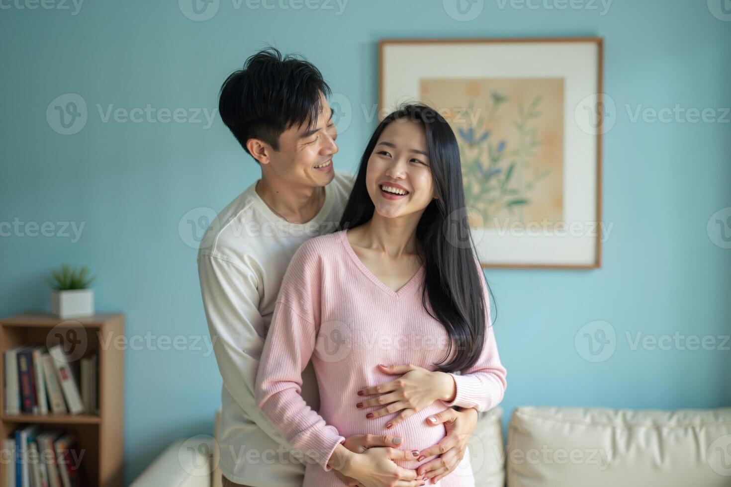photo of couple man and pregnant woman relaxing standing both hands touching her belly at house,