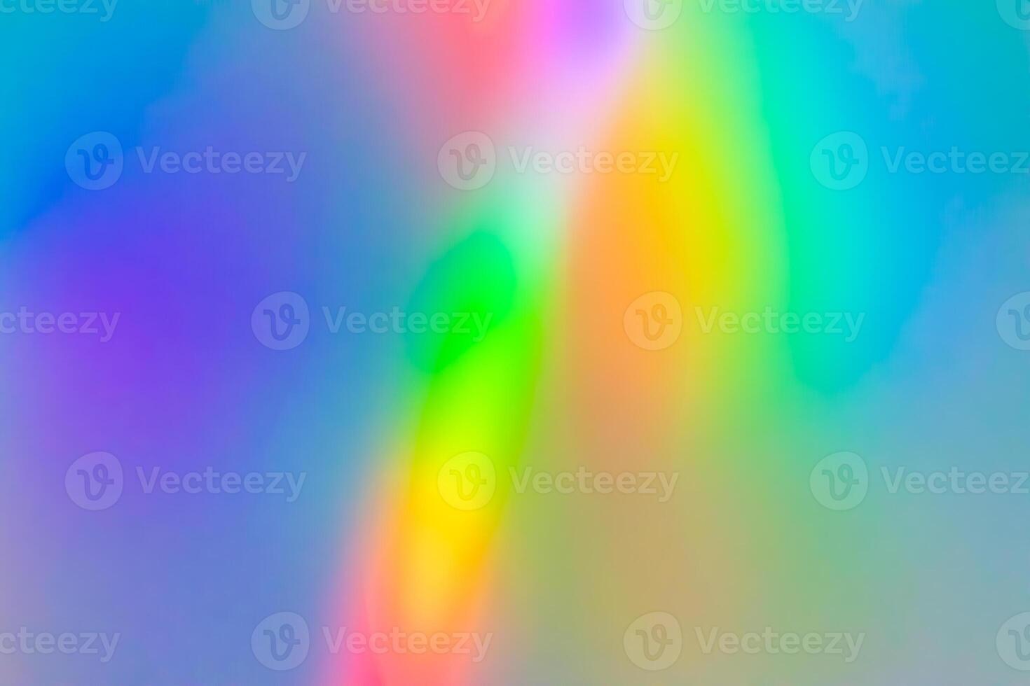 Abstract blur holographic rainbow foil iridescent background photo
