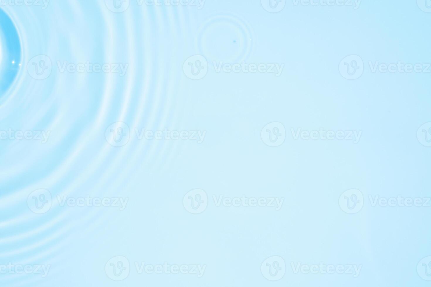 Abstract transparent water shadow surface texture natural ripple on blue background photo