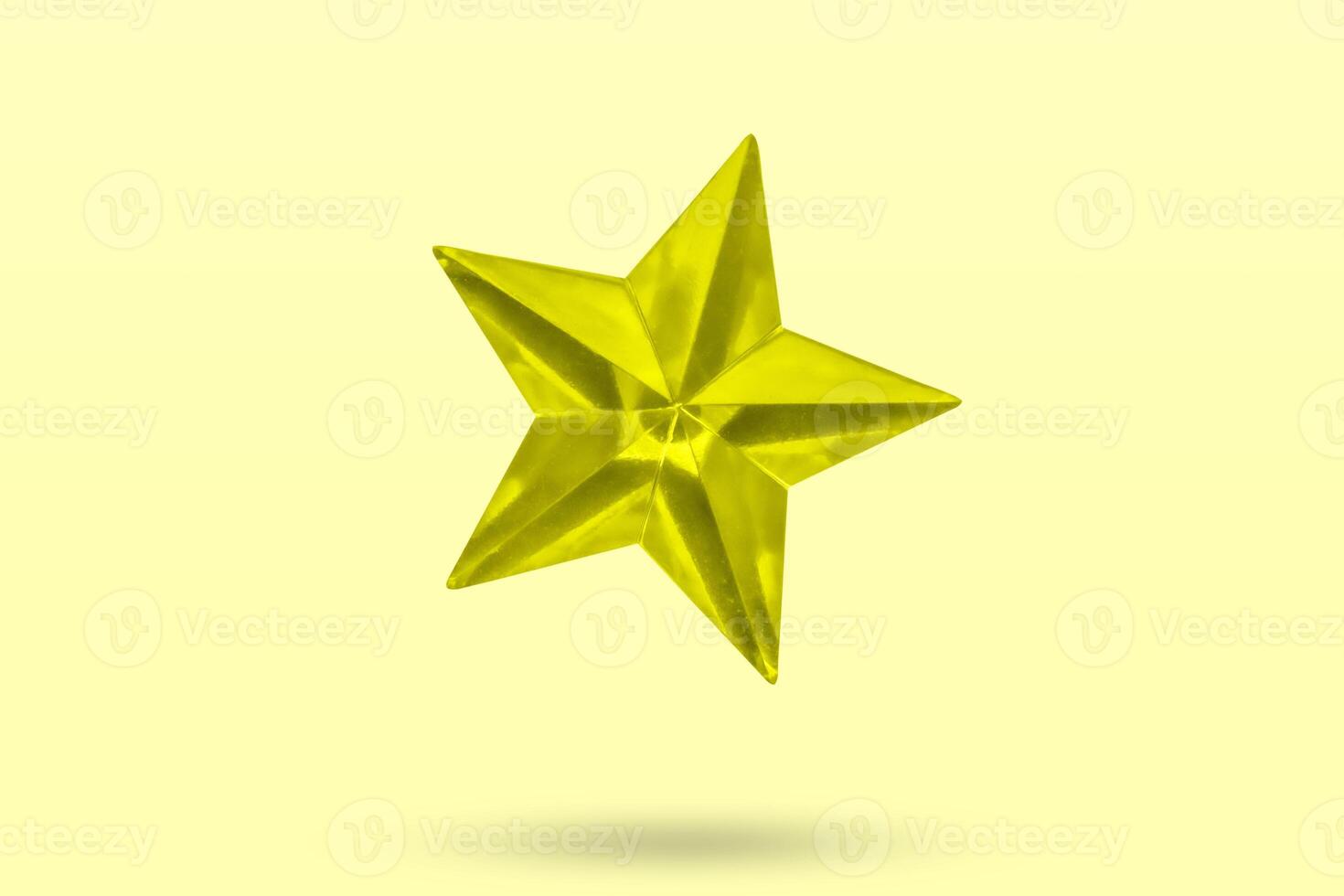 golden Christmas star jewels sticker isolated on yellow background photo