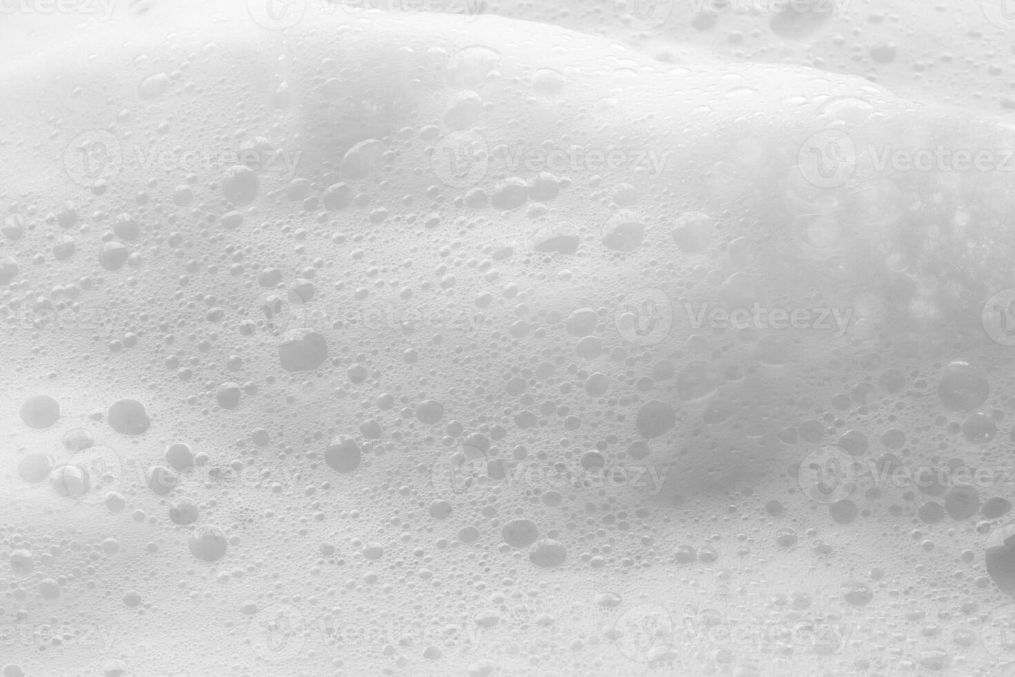 Abstract white soap foam bubbles texture background photo