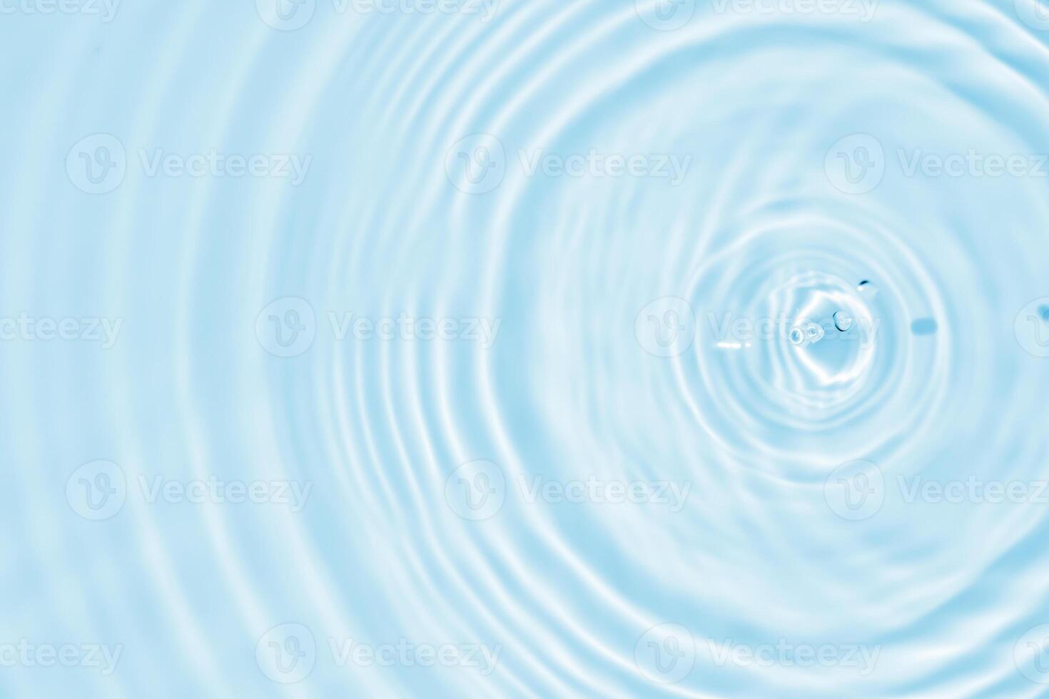 Abstract transparent water shadow surface texture natural ripple on blue background photo