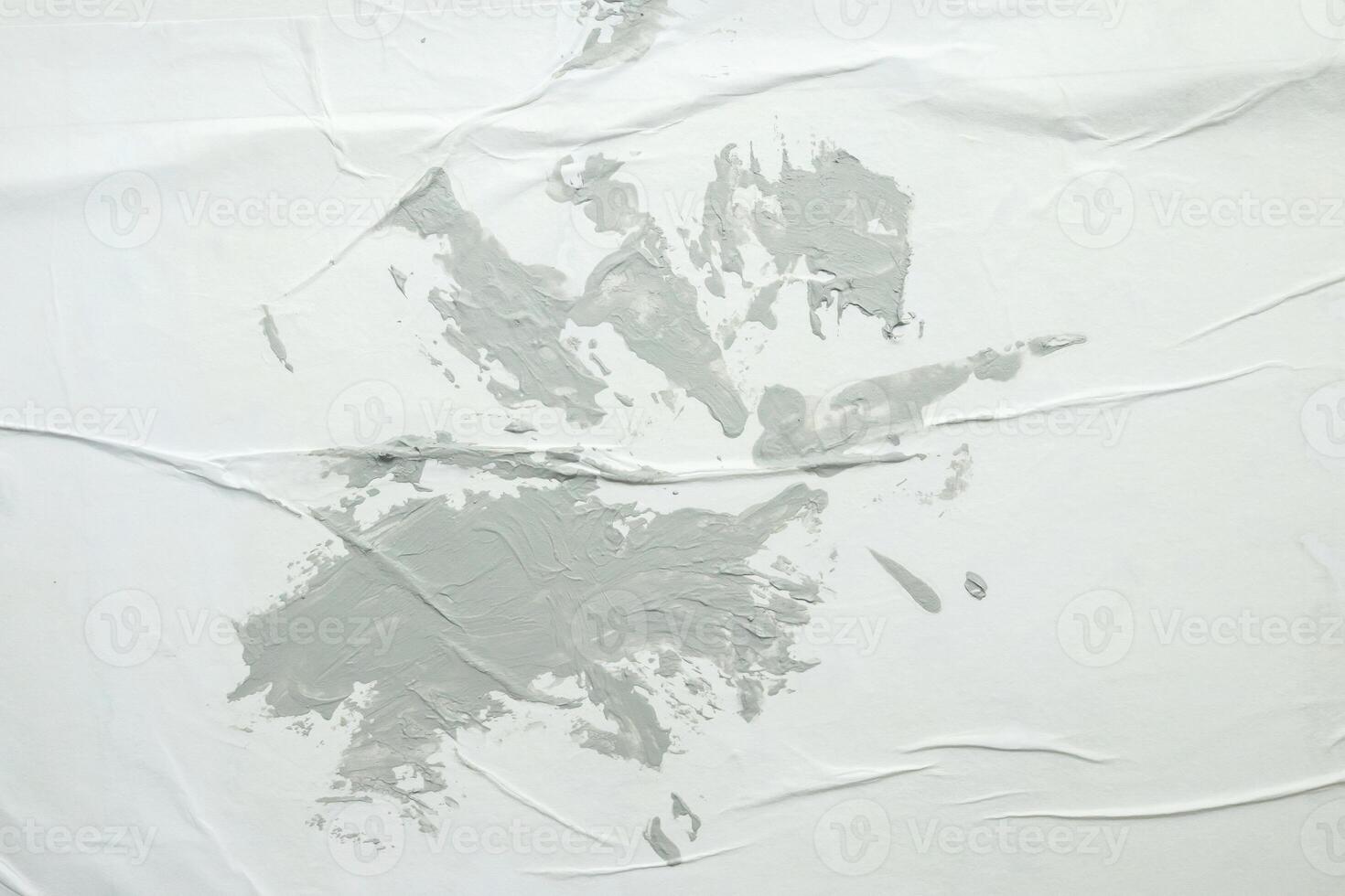 Gray color on white crumpled and creased paper poster texture background photo