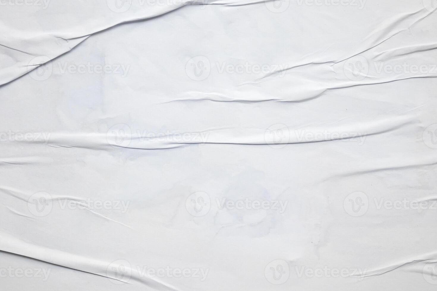 white crumpled and creased glued wrinkled paper poster texture background photo