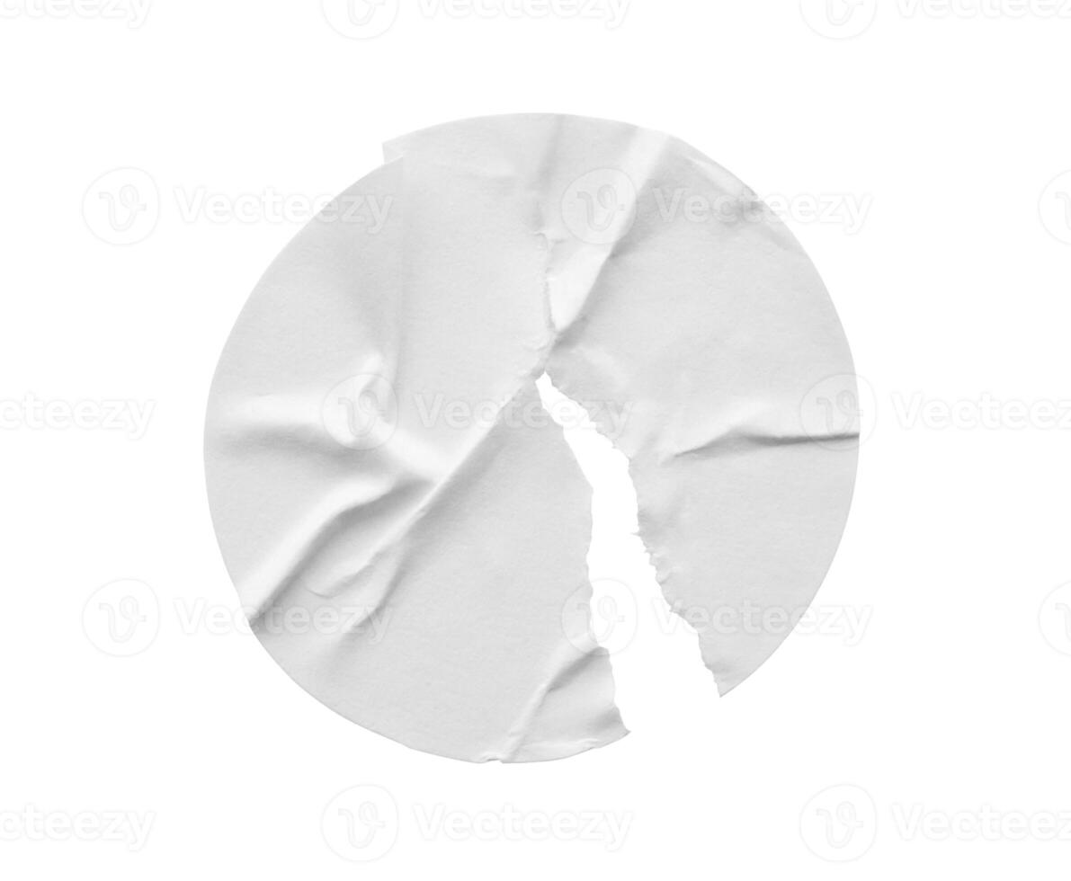 Blank white round torn paper sticker label isolated on white background photo
