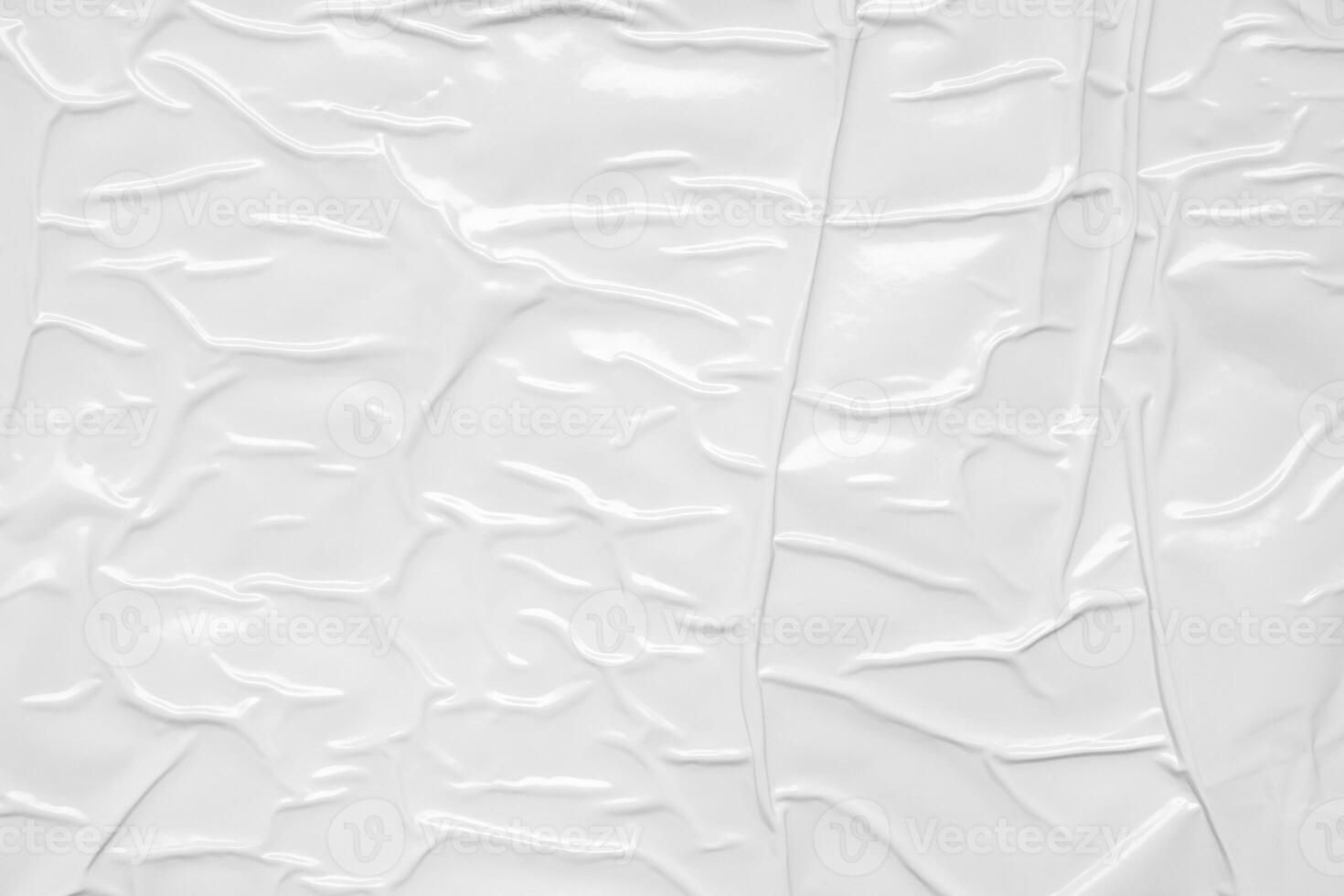 white crumpled and creased plastic bag texture background photo