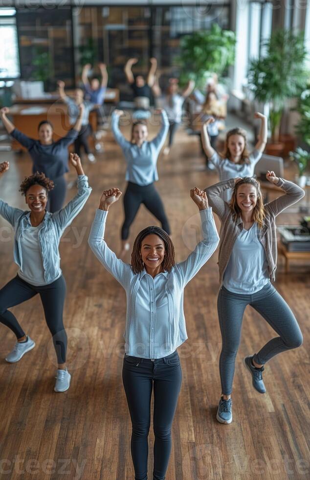 Office workers from different backgrounds engaged in group stretching exercises during a break photo