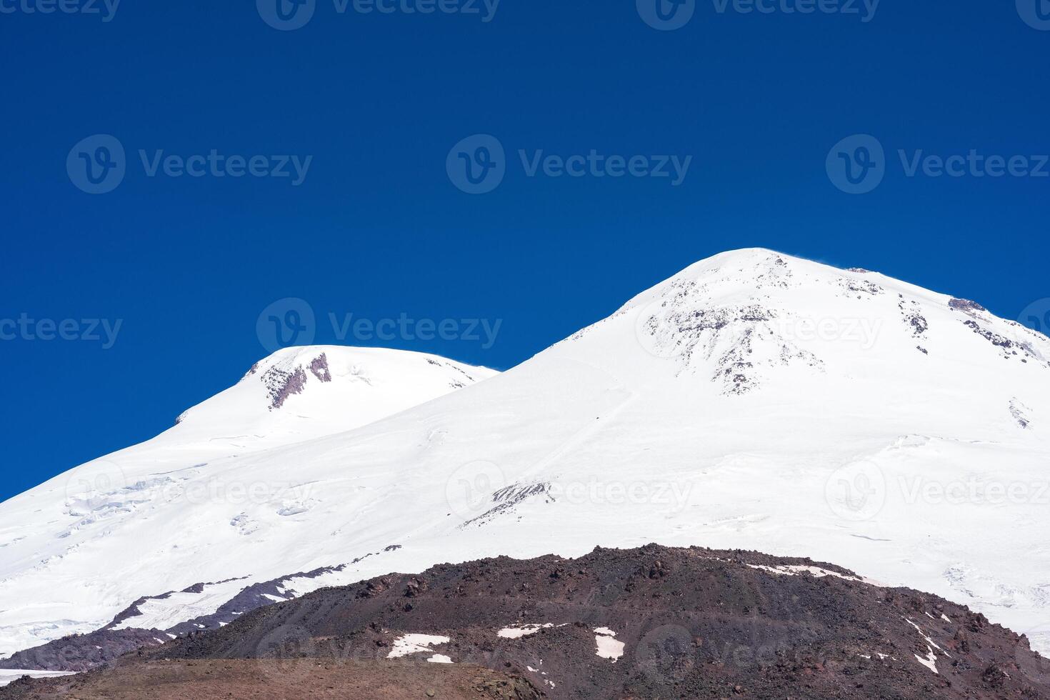 snowy mountain peak, view of the double top of Mount Elbrus photo