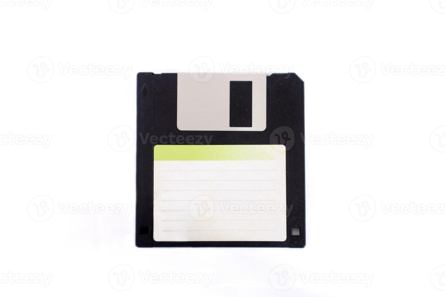 Top view of floppy disk with label, on a white background photo