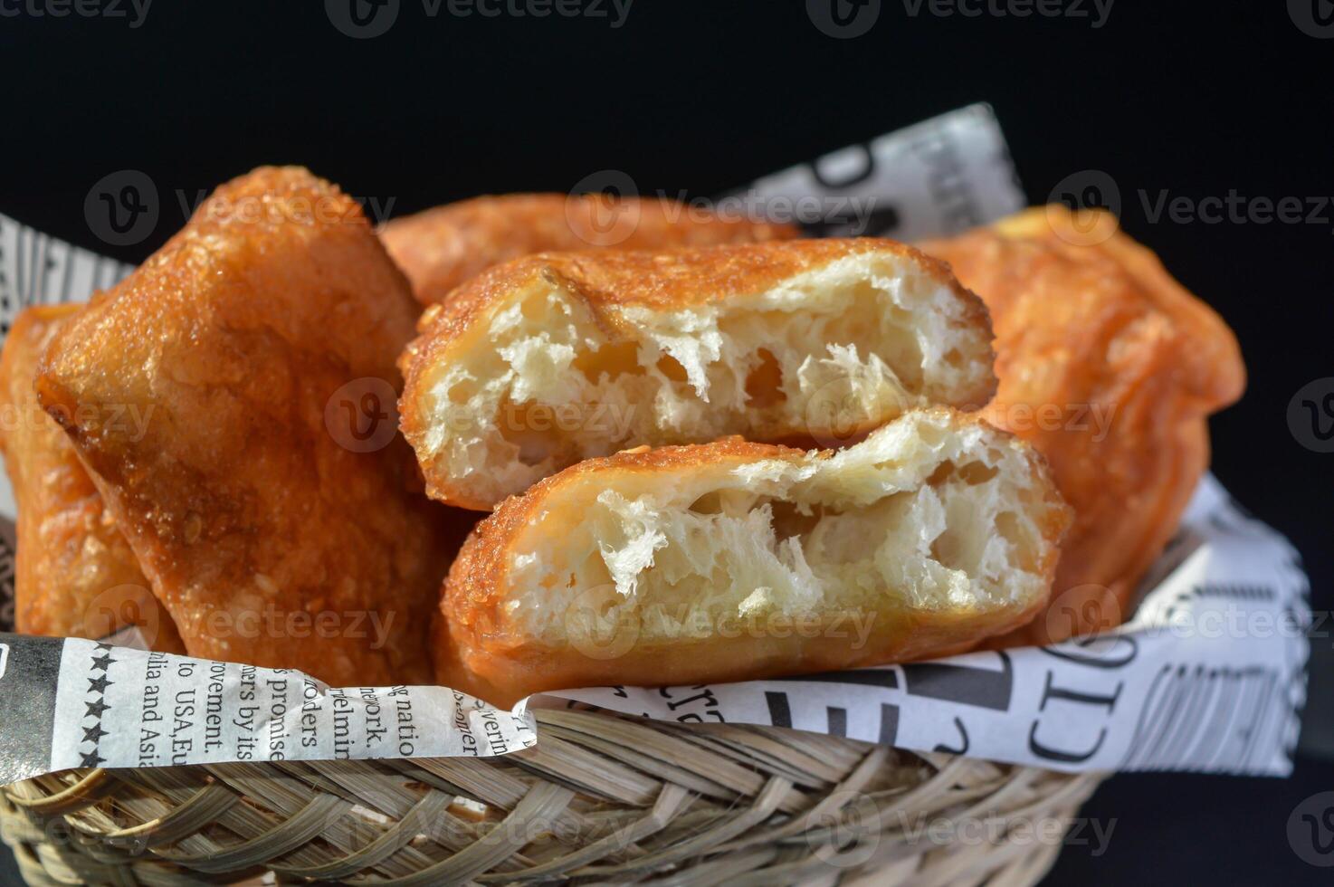 Fried bread Indonesian cake made of flour with sweet, salty and savory flavors. photo