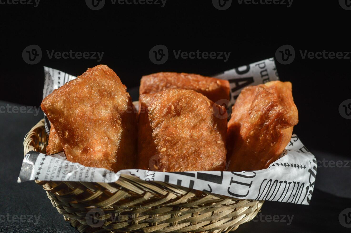 Fried bread Indonesian cake made of flour with sweet, salty and savory flavors. photo