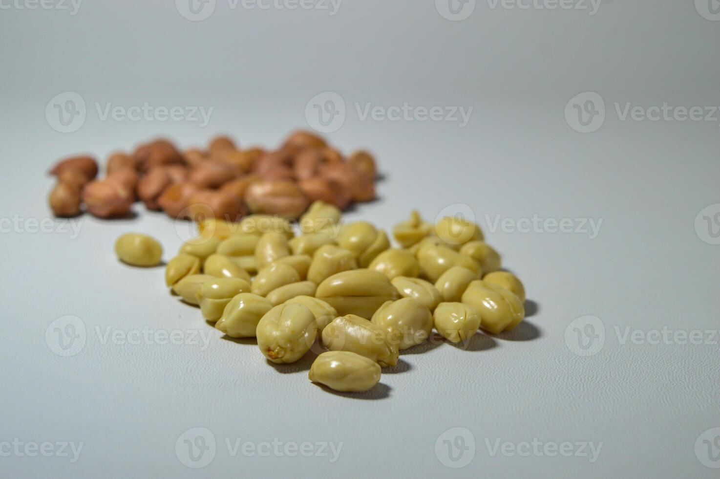 Fried peanuts. Served in a transparent jar. Selective focus photo