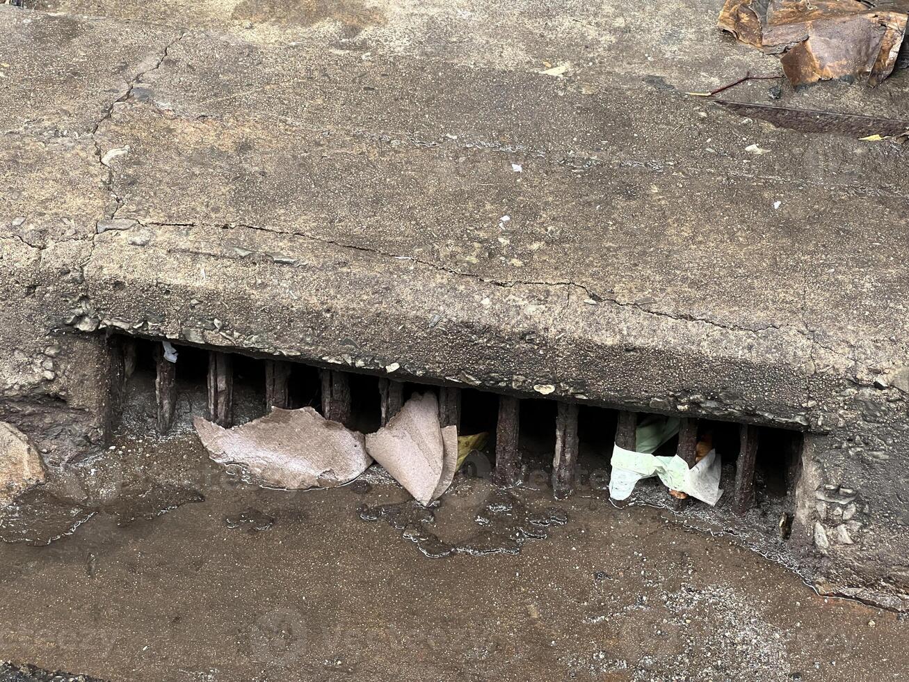 hole on the cement floor photo