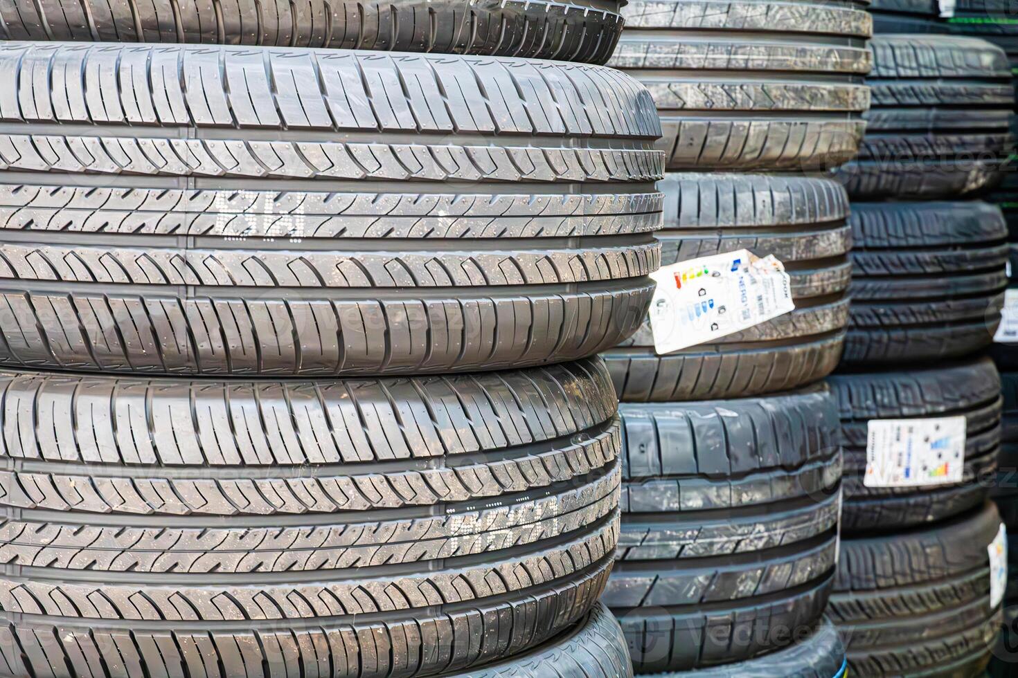 Stack of Used Car Tires at a Garage photo