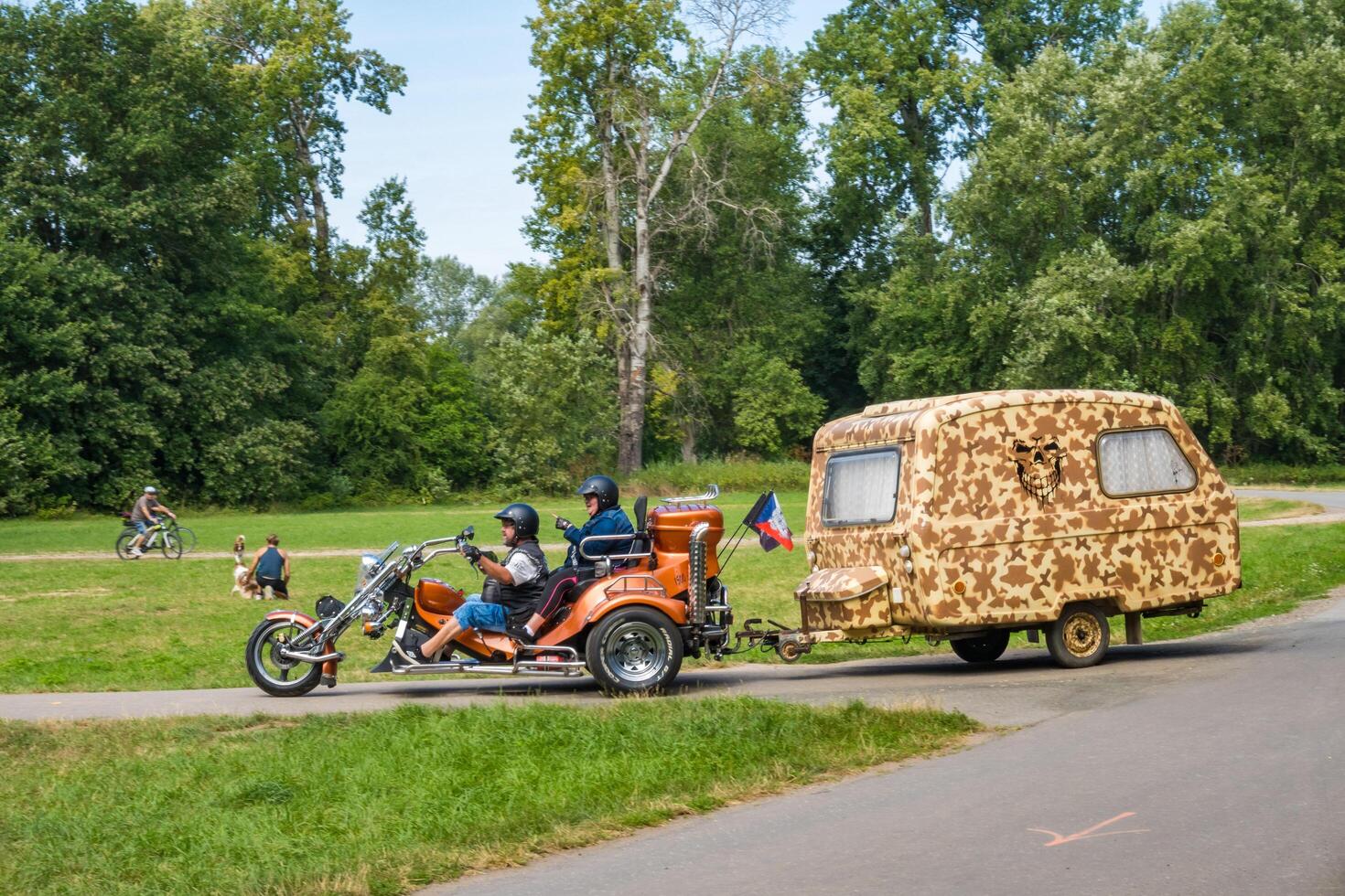 Podebrady- Czech- 27 July 2024. three-wheeled motorcycle with a trailer for rest photo