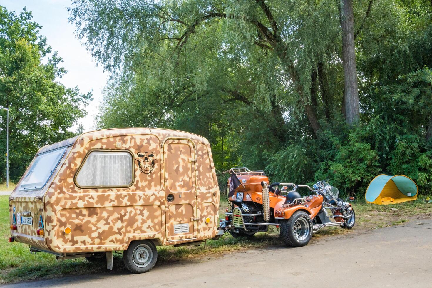 Podebrady- Czech- 27 July 2024. three-wheeled motorcycle with a trailer for rest photo