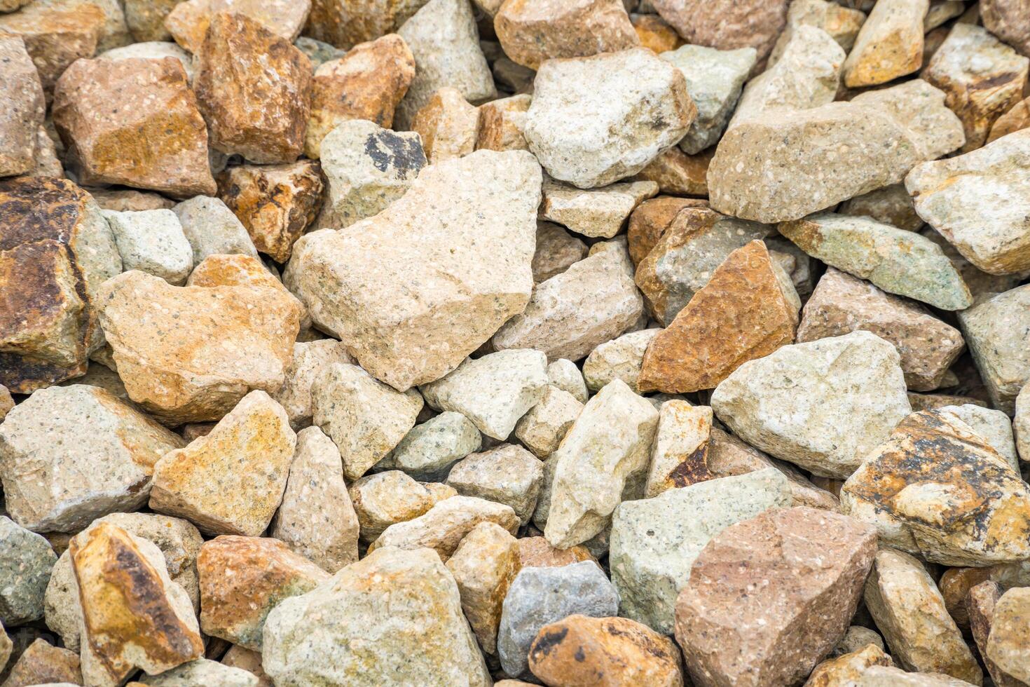 boulder pebble beach stones background seamless texture for design use photo