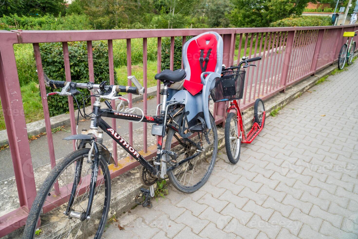 Bike with children carrying seat attached. Cycle with kids transportation photo