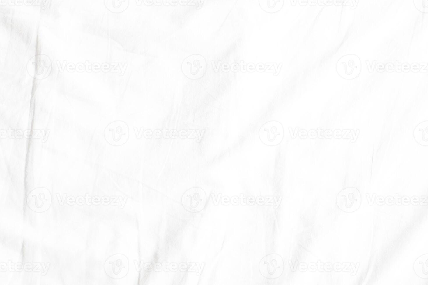 Abstract White Bedding Sheets or White wrinkled fabric background texture and Texture with copy-space Creased or wrinkled white fabric,Soft focus photo