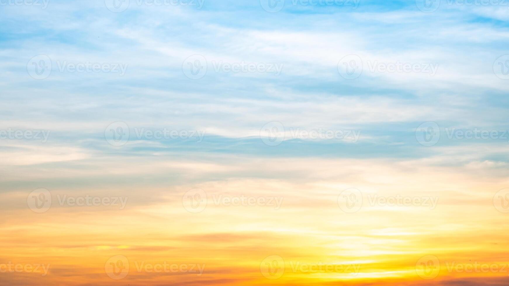 Beautiful , luxury soft gradient orange gold clouds and sunlight on the blue sky perfect for the background, take in everning,Twilight, Large size, high definition landscape photo