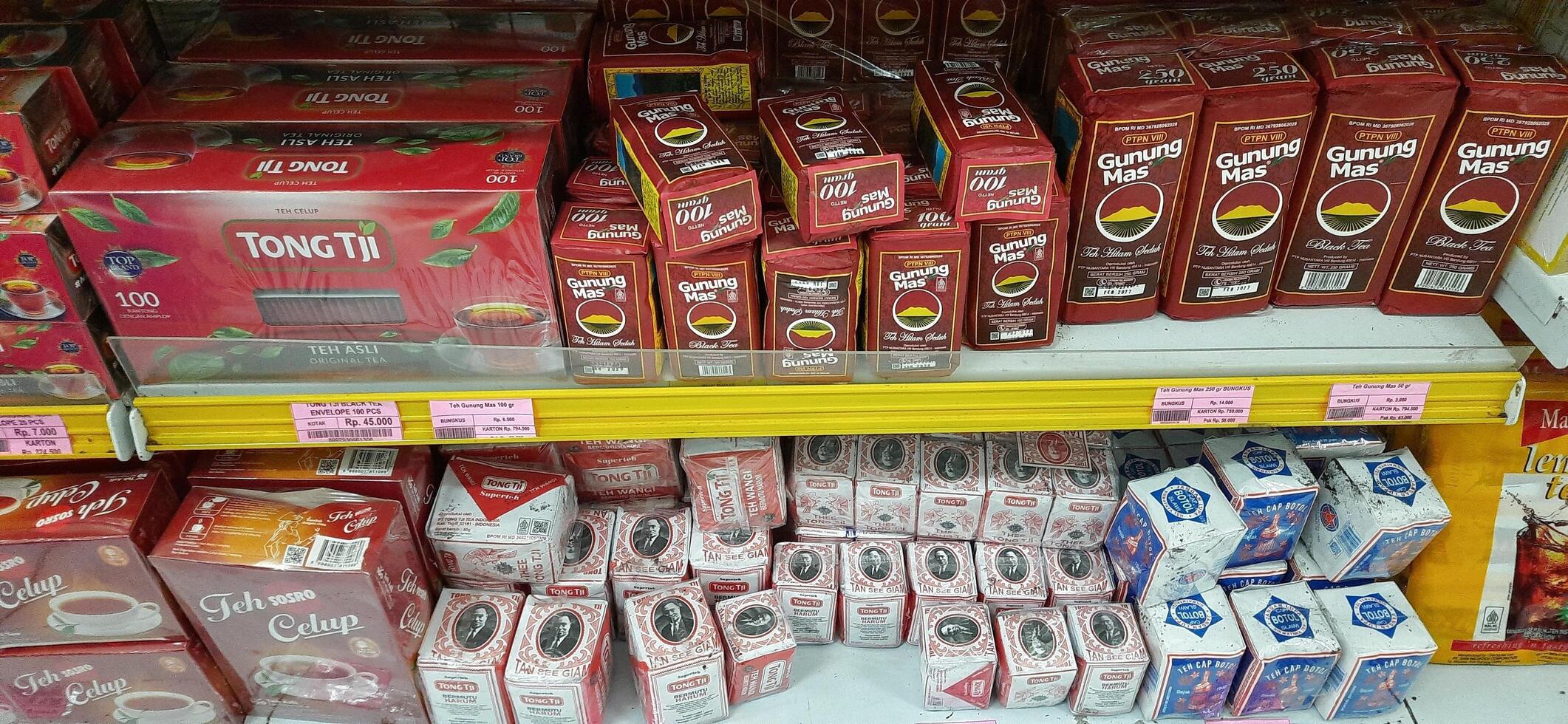 Coang supermarket shelf display. One of the complete cake and food equipment and ingredients stores in Makassar. South Sulawesi, Indonesia - August 7 2024 photo