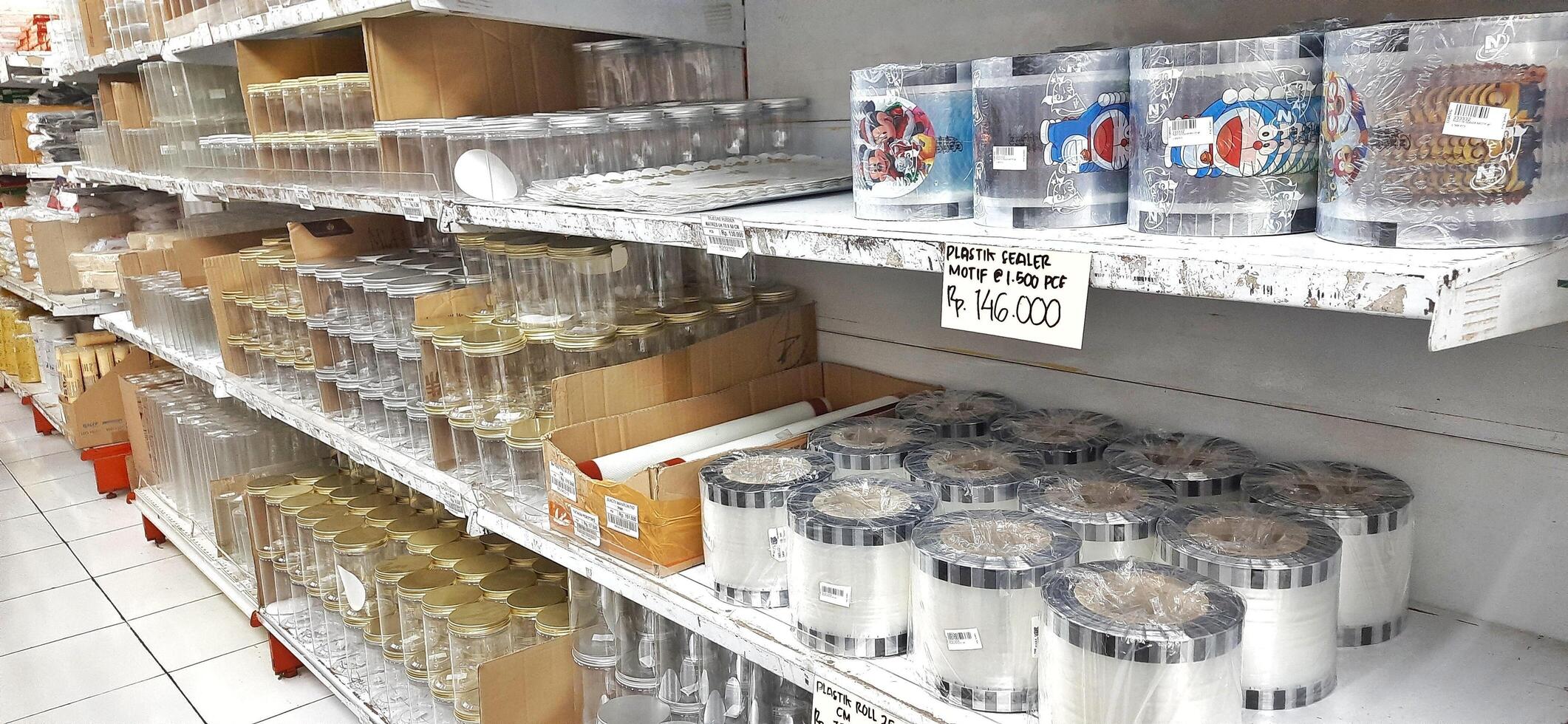 Coang supermarket shelf display. One of the complete cake and food equipment and ingredients stores in Makassar. South Sulawesi, Indonesia - August 7 2024 photo