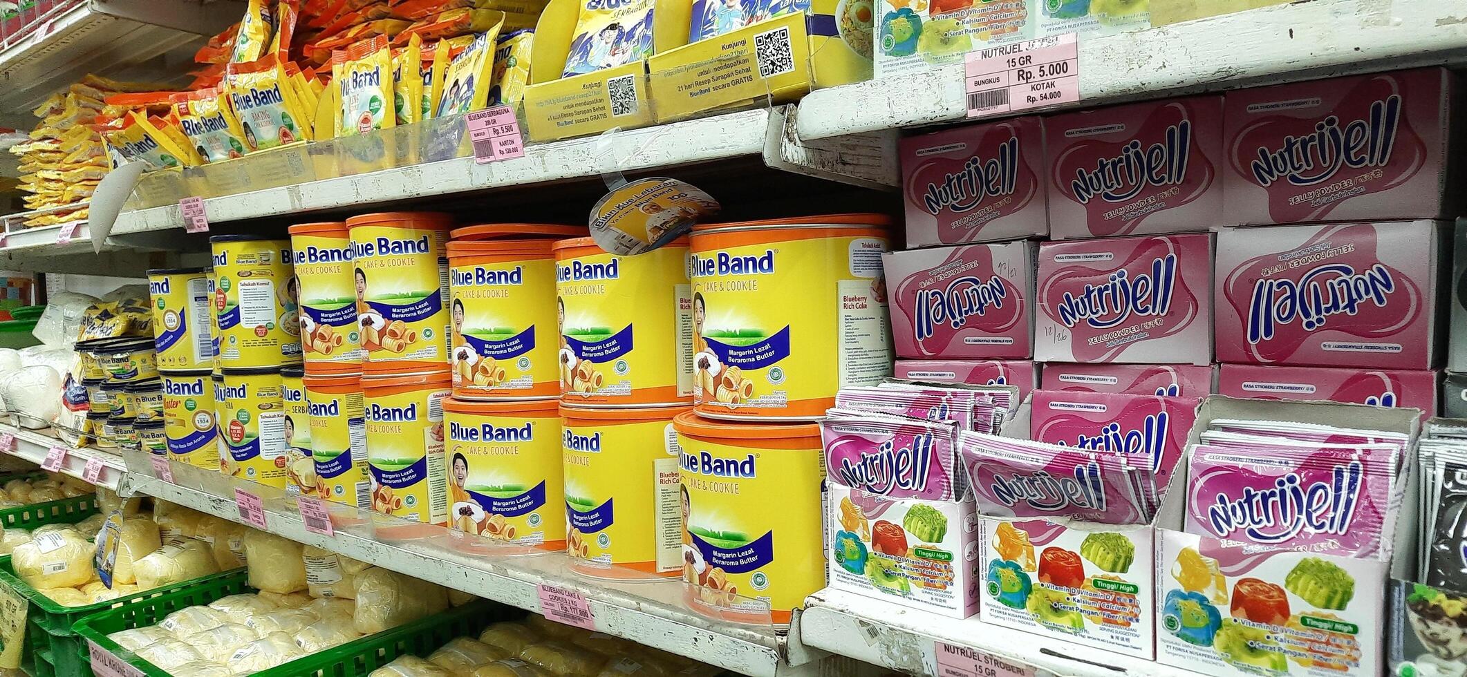 Coang supermarket shelf display. One of the complete cake and food equipment and ingredients stores in Makassar. South Sulawesi, Indonesia - August 7 2024 photo