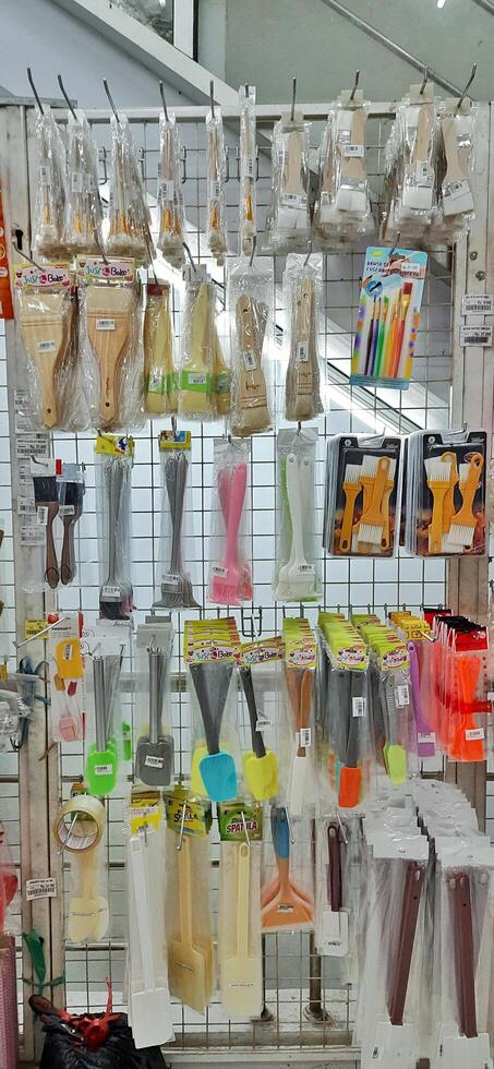Coang supermarket shelf display. One of the complete cake and food equipment and ingredients stores in Makassar. South Sulawesi, Indonesia - August 7 2024 photo