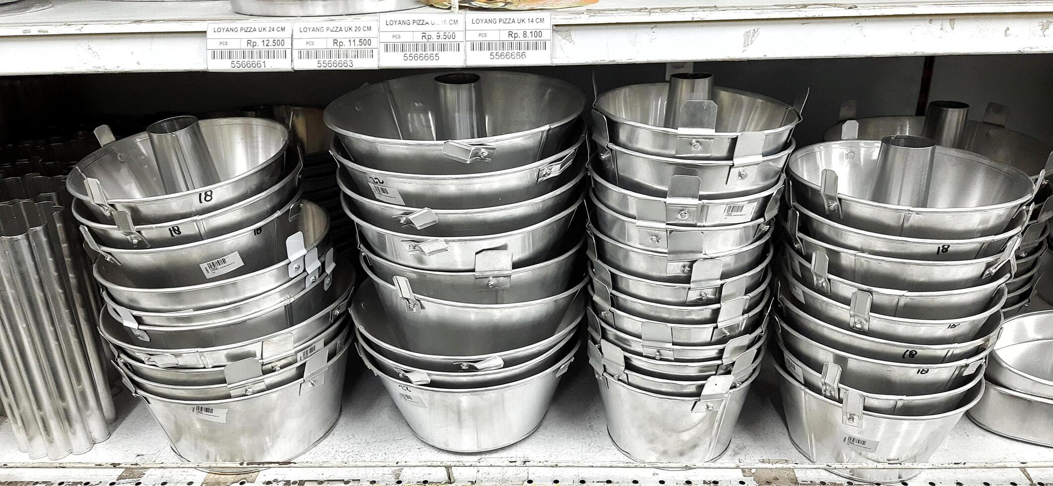 Coang supermarket shelf display. One of the complete cake and food equipment and ingredients stores in Makassar. South Sulawesi, Indonesia - August 7 2024 photo