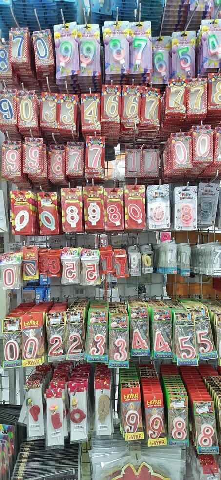 Coang supermarket shelf display. One of the complete cake and food equipment and ingredients stores in Makassar. South Sulawesi, Indonesia - August 7 2024 photo