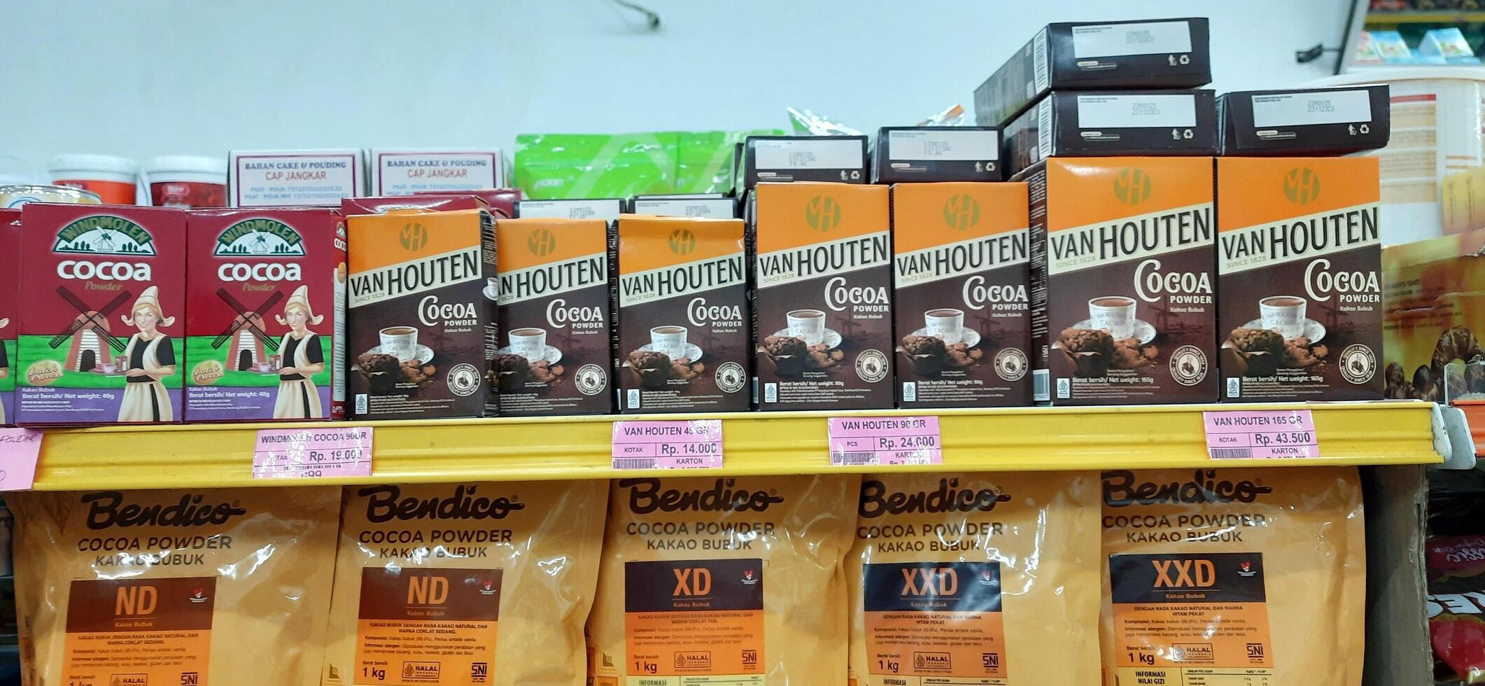 Coang supermarket shelf display. One of the complete cake and food equipment and ingredients stores in Makassar. South Sulawesi, Indonesia - August 7 2024 photo