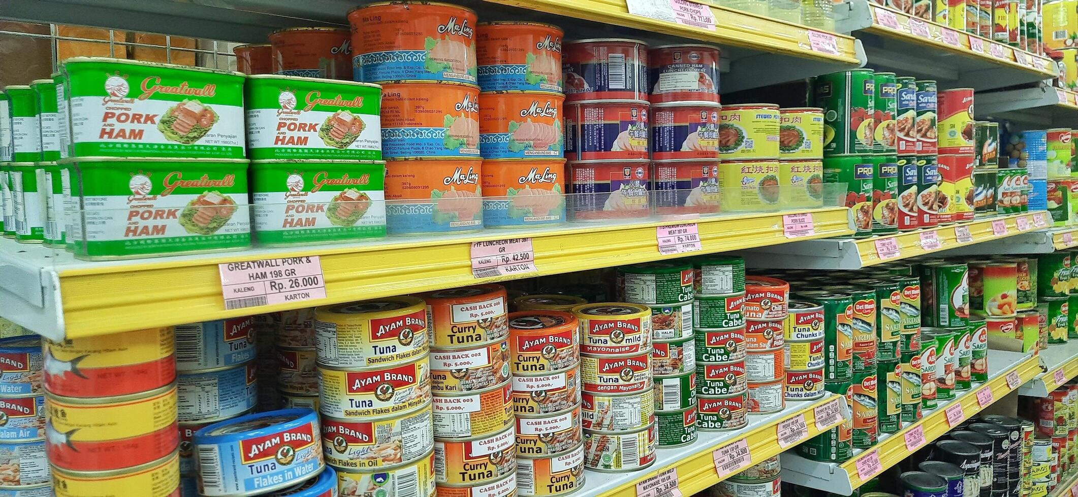 Coang supermarket shelf display. One of the complete cake and food equipment and ingredients stores in Makassar. South Sulawesi, Indonesia - August 7 2024 photo