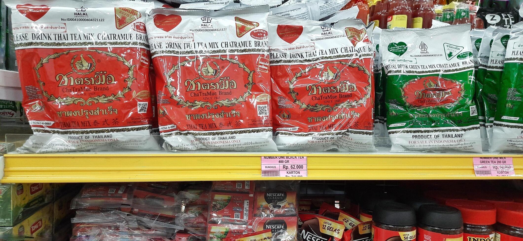 Coang supermarket shelf display. One of the complete cake and food equipment and ingredients stores in Makassar. South Sulawesi, Indonesia - August 7 2024 photo