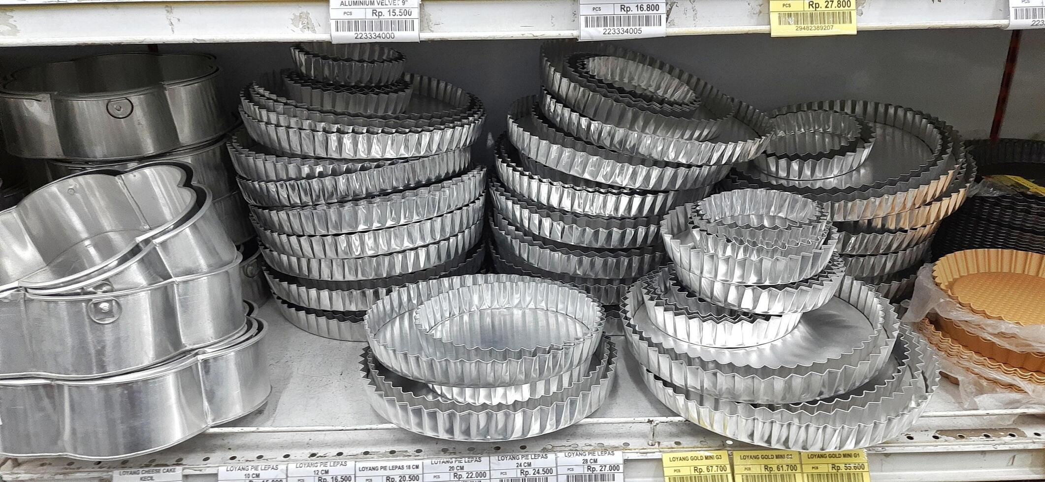 Coang supermarket shelf display. One of the complete cake and food equipment and ingredients stores in Makassar. South Sulawesi, Indonesia - August 7 2024 photo