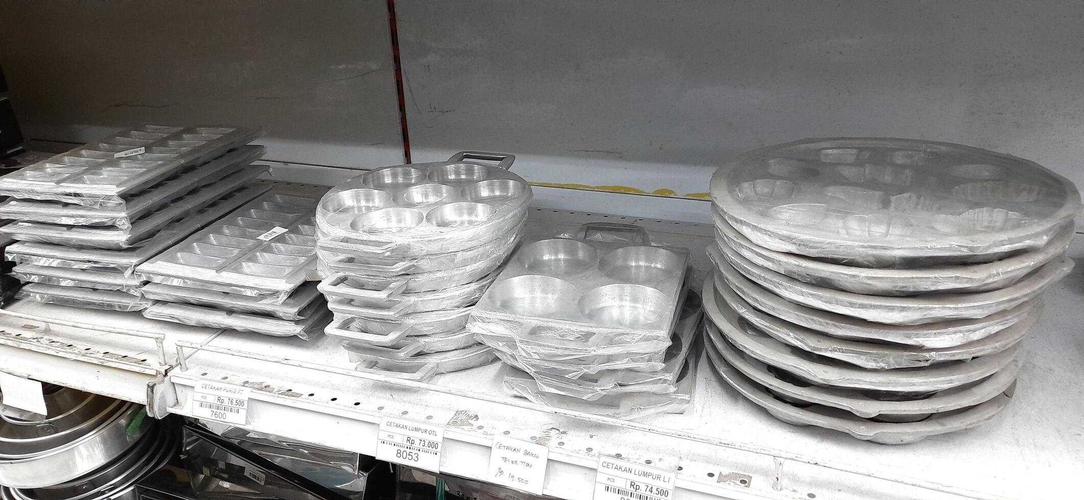 Coang supermarket shelf display. One of the complete cake and food equipment and ingredients stores in Makassar. South Sulawesi, Indonesia - August 7 2024 photo
