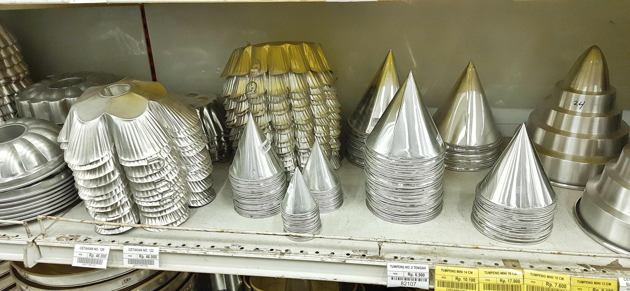 Coang supermarket shelf display. One of the complete cake and food equipment and ingredients stores in Makassar. South Sulawesi, Indonesia - August 7 2024 photo