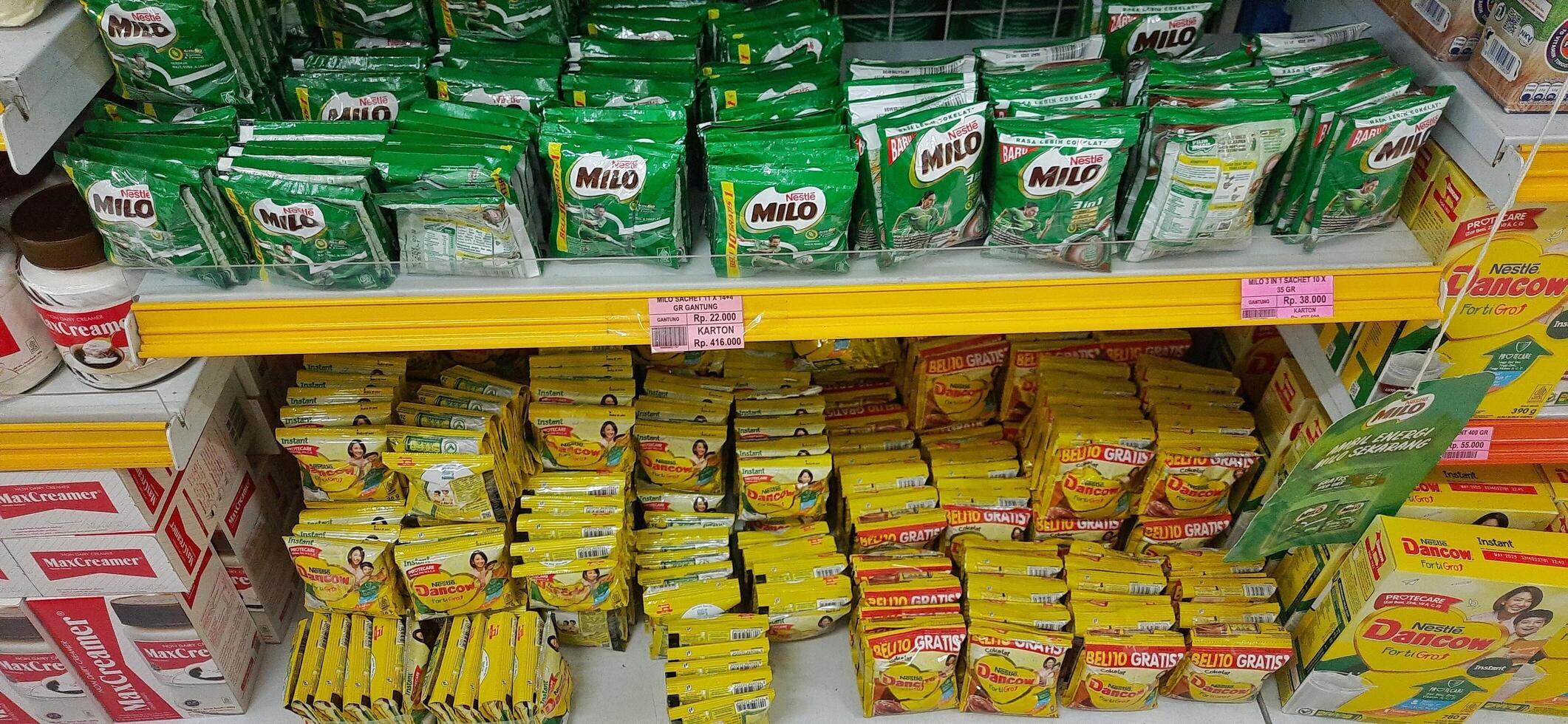Coang supermarket shelf display. One of the complete cake and food equipment and ingredients stores in Makassar. South Sulawesi, Indonesia - August 7 2024 photo