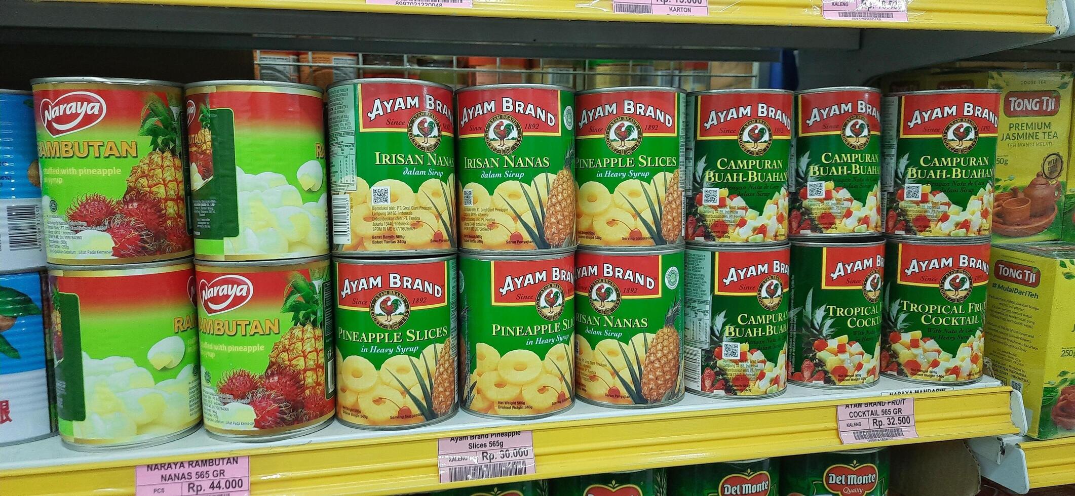 Coang supermarket shelf display. One of the complete cake and food equipment and ingredients stores in Makassar. South Sulawesi, Indonesia - August 7 2024 photo