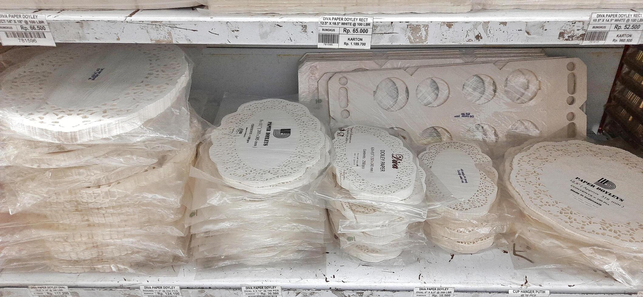 Coang supermarket shelf display. One of the complete cake and food equipment and ingredients stores in Makassar. South Sulawesi, Indonesia - August 7 2024 photo